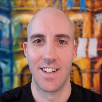 A man smiling at the camera